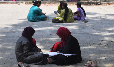 Students sit and study